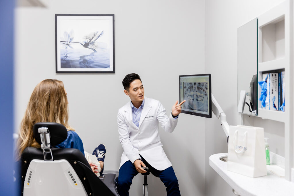 dentist talking to a patient about restorative dentistry in Herndon, VA.
